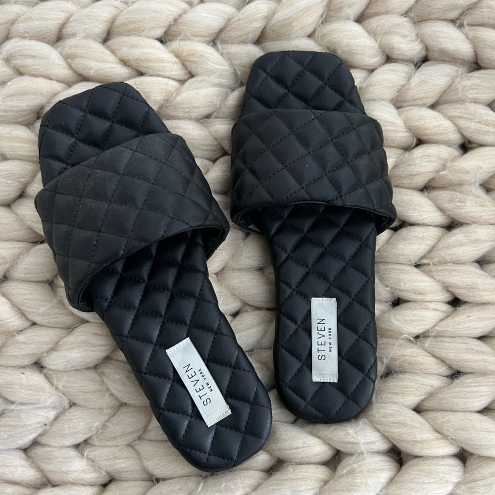 Black quilted sandals